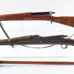 Two Dummy Rifle Auctions and a Practice Naval Saber